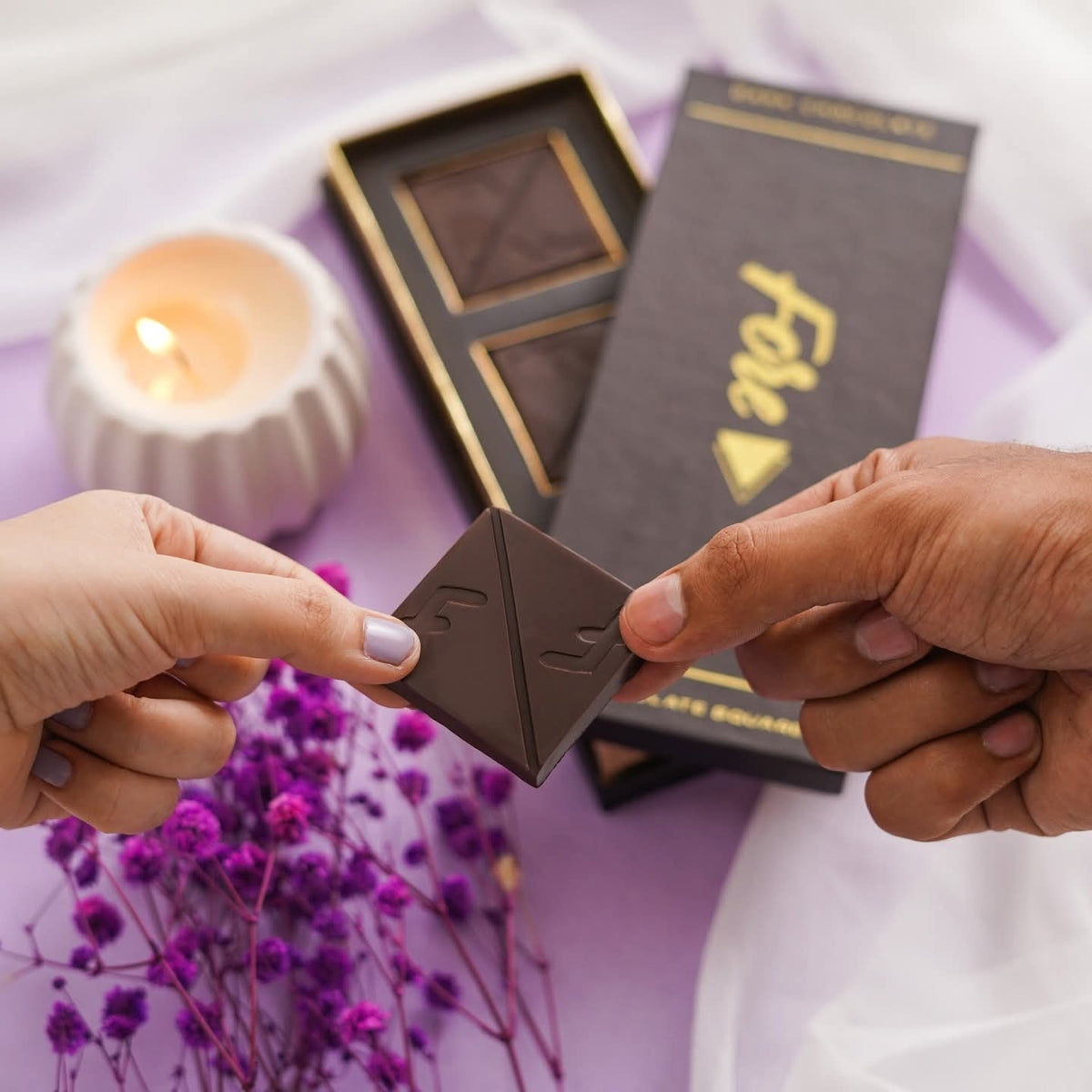 Couple Holding Chocolate